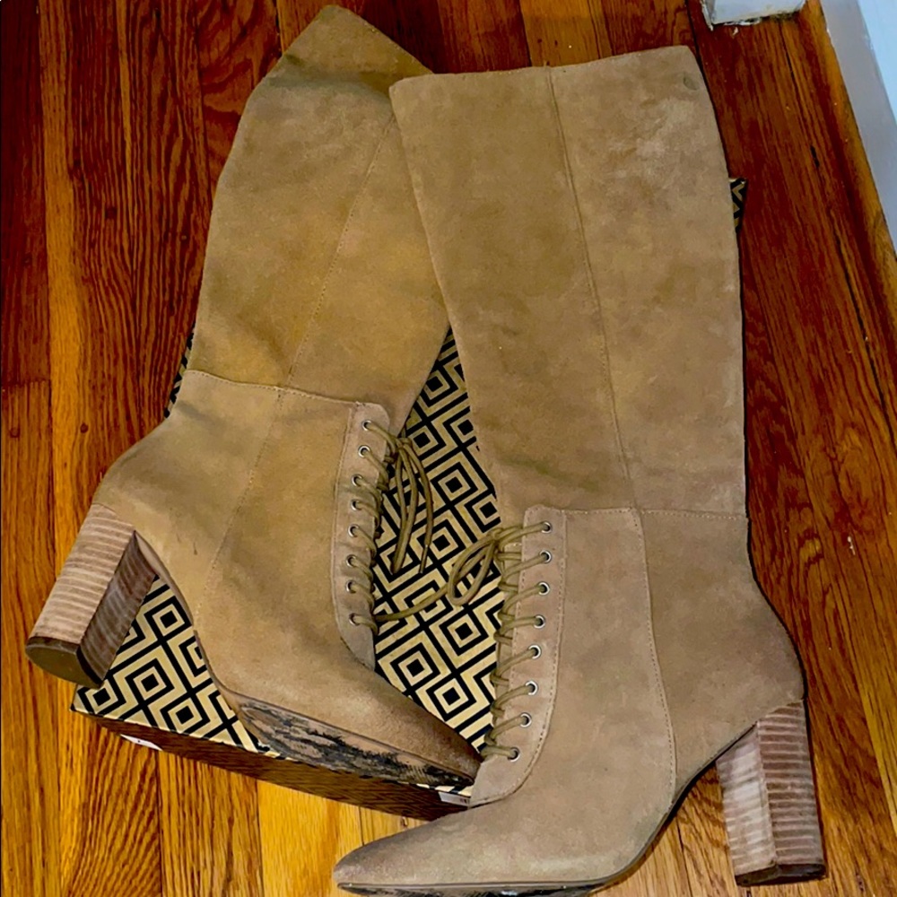 Tan high heeled bulletin boots